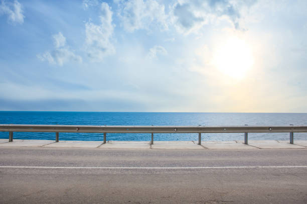 istock highway with fencing along the sea 1479007608