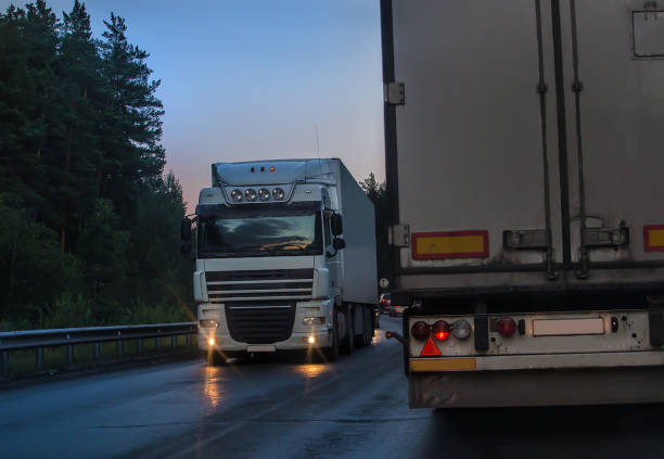 istock Freight traffic on suburban highway at night 1479007741