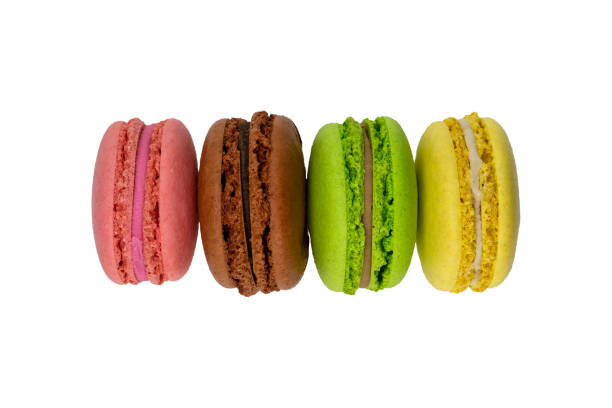 istock Four multicolor macaron cookies isolated on a white background. 1479012112