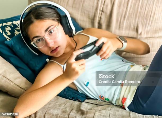 Playing Video Game Stock Photo - Download Image Now - 12-13 Years, Brand Name Video Game, Brazil