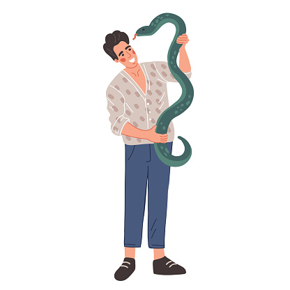A happy man holds a snake. The guy smiles at the reptile. Pet, veterinary medicine