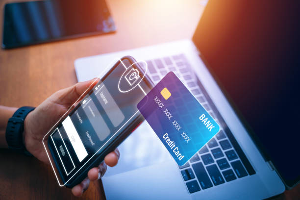 istock Smart wallet concept with credit or debit card payment application on smartphone screen. Security password locks the phone. The concept of mobile phones and personal data protection 1479016475