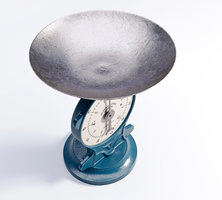 A vintage cast iron weight scale on a white isolated background - 3D render