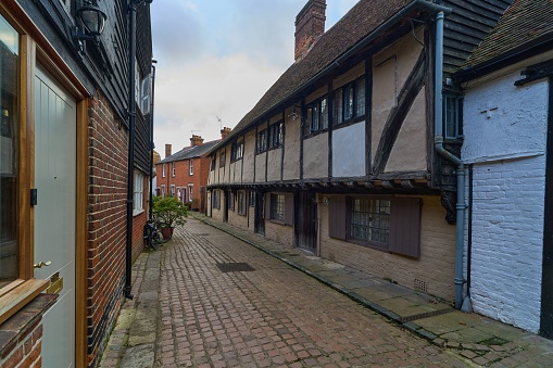 The Shambles, a medieval street preserved in the heart of the English city of York, still busy with boutique shops and cafes.