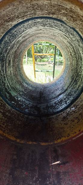 istock Metal pipe tunnel in garden 1479019905