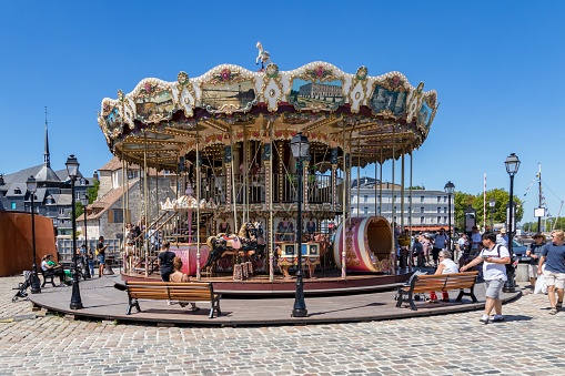 Honfleur, France – August 08, 2022: The Historic carousel at the port of Honfleur, a small community in the Normandy region, France