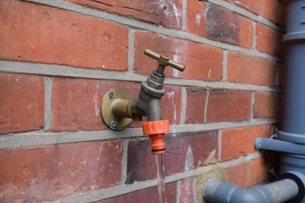 istock Running water from garden tap on a brick wall 1479028898