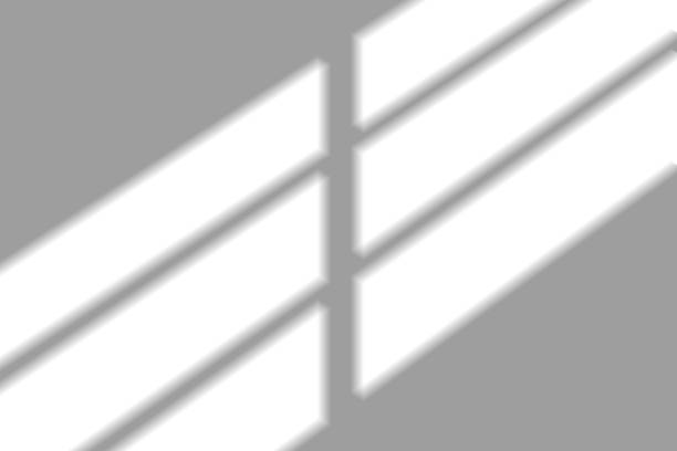 istock blur background. Abstract shadow of the window in morning light on white wall texture 1479032961