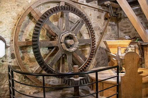 Internal mechanism with gears and pulley of a water mill