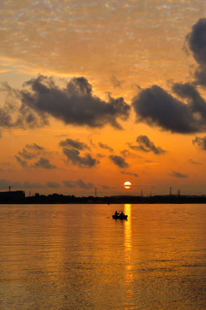 istock A beautiful sunrise with cloudy sky on the beach. 1479043966