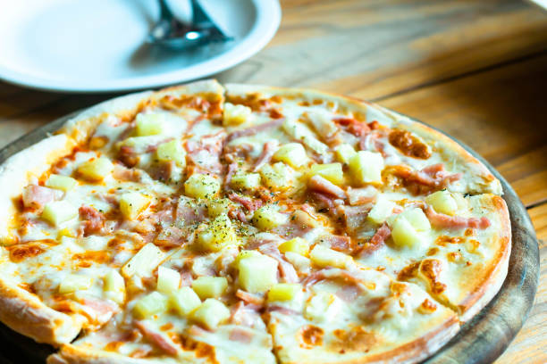 istock pizza Hawaiian with pineapple and ham 1479045843