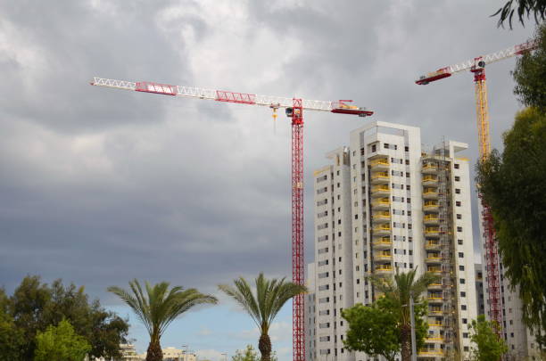 istock Modern multi-storey building. Construction crane. luxury real estate 1479046064