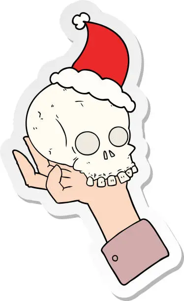 Vector illustration of hand drawn sticker cartoon of a hand holding skull wearing santa hat