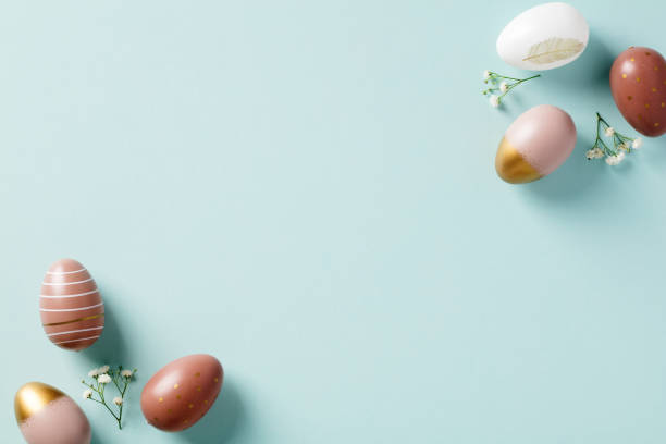 istock Happy Easter flat lay composition with Easter eggs and flowers in corners of frame. 1479049128