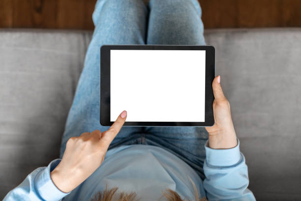 istock Unrecognizable Woman Using Blank Digital Tablet With White Screen At Home 1479050705