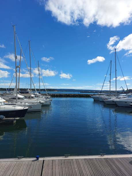istock Breakwater and moored yachts from a wooden deck 1479055855