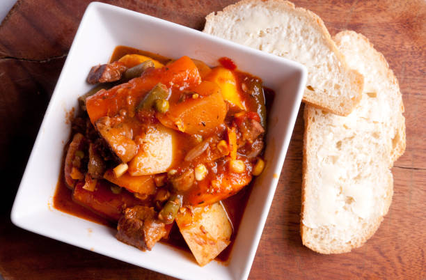 istock a big bowl of lamb stew with bread for dipping 1479056334