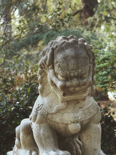 istock Old sculpture of a dragon in a park 1479057306