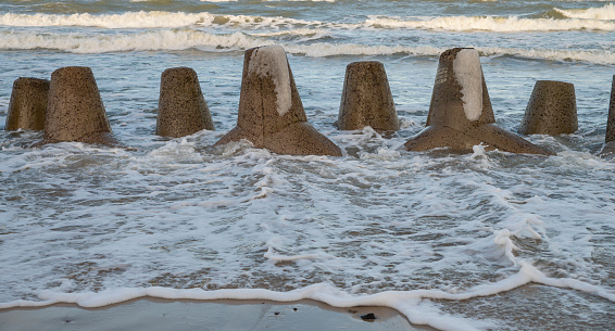 Wave-breakers on the seashore of the Baltic Sea.