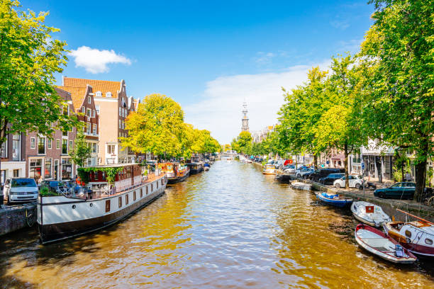 istock Amsterdam centre. Canal in a Sunny Day with Clear Sky. 1479061084