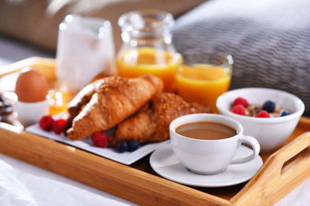 istock A tray with breakfast on a bed in a hotel room 1479066819