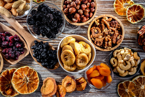 istock Composition with a variety of dried fruits and assorted nuts. 1479068765