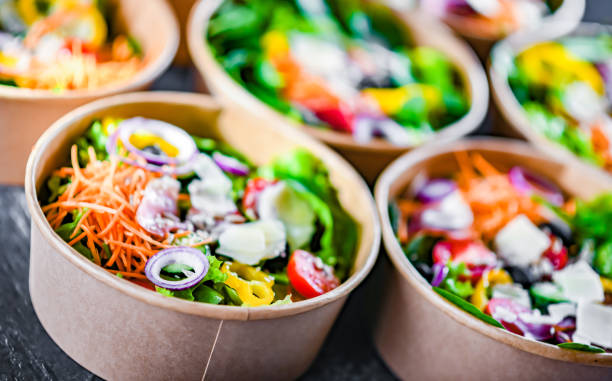 istock Paper boxes with pre-packaged vegetable salads ready for sale 1479069371
