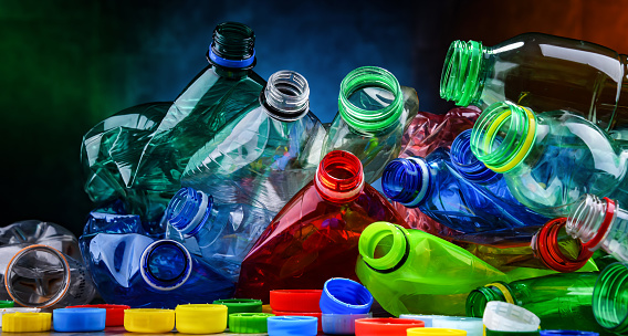 Empty colored drink bottles. Recyclable plastic waste.