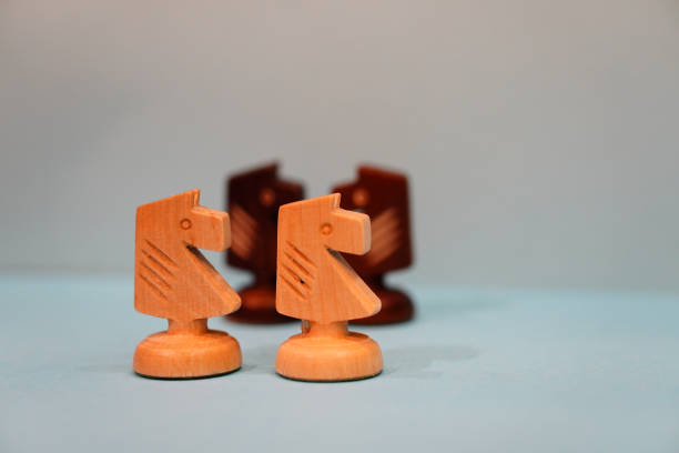 istock Selective focus shot of two white wooden knights 1479069570