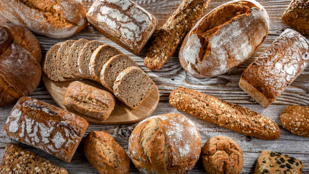 istock Assorted bakery products including loaves of bread and rolls 1479070256