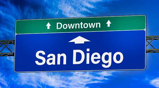 Road sign indicating direction to the city of San Diego.
