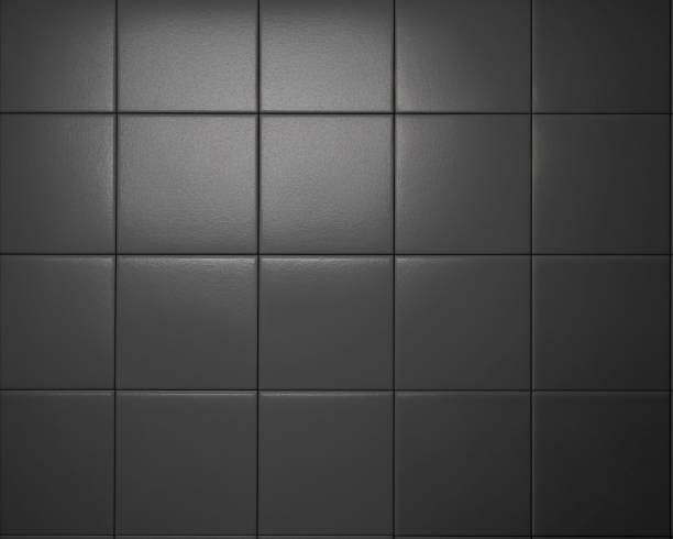 istock Stylized black and white tiled wall featuring contrasting dark and light hues 1479071376