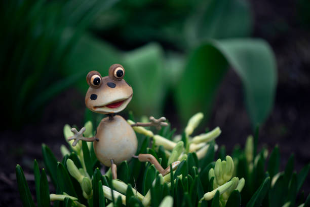 istock Fairy tale character in the flower garden. 1479072107