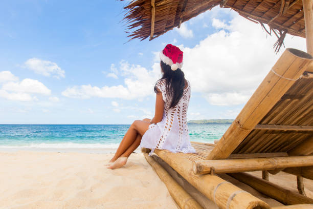 istock Woman sitting at chaise lounge 1479073886