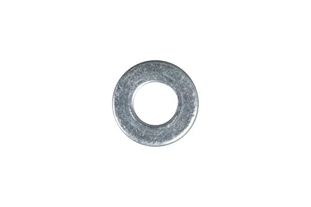 Washer M3 DIN9021 enlarged zinc isolated on white background.