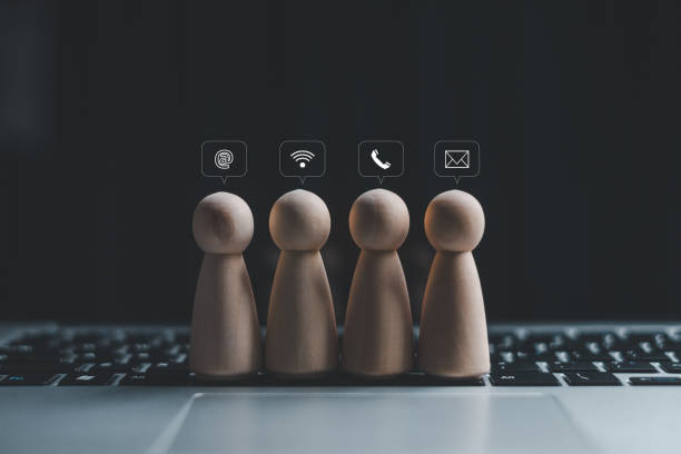 istock Website page contact us or e-mail marketing concept, Customer support hotline Contact us people connection. banner with copy space. cube wood with email, call phone, address, Chat message icons. 1479076611