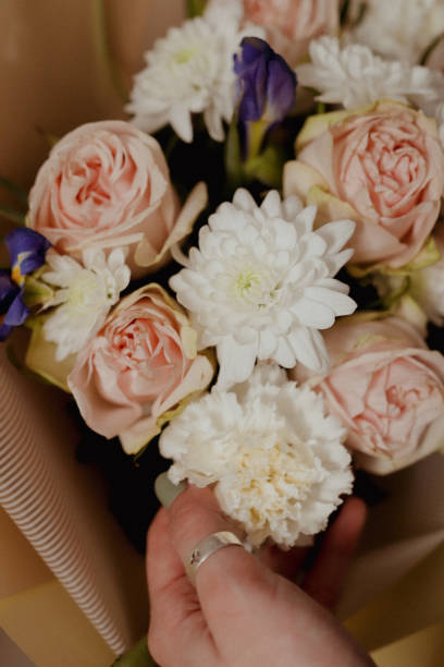 istock Bouquet of roses and white carnations 1479076679