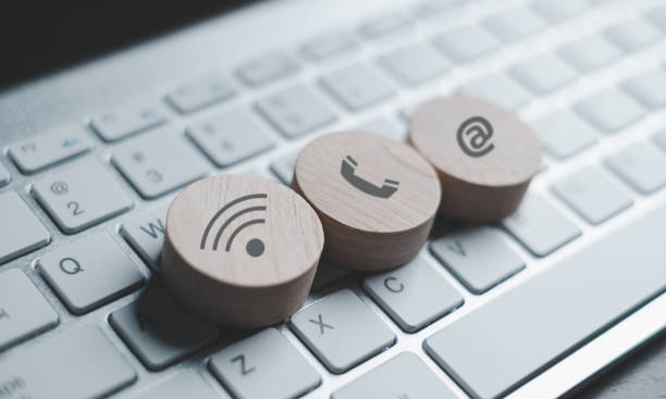 istock Website page contact us or e-mail marketing concept, Customer support hotline Contact us people connection. banner with copy space. cube wood with email, call phone, address, Chat message icons. 1479077007