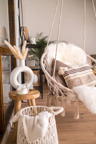 istock Modern interior featuring an array of white chairs  in the center of the room 1479077392