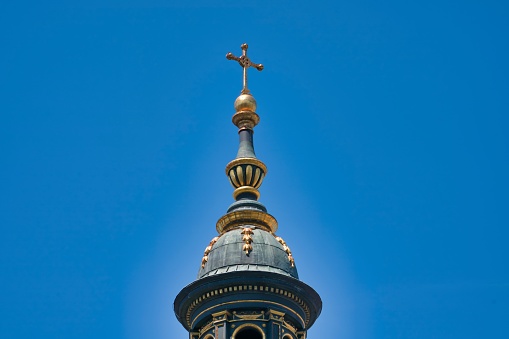 Budapest, Hungary – July 17, 2019: The cross on the tower of St. Stephen's Basilica in Budapest, Hungary.