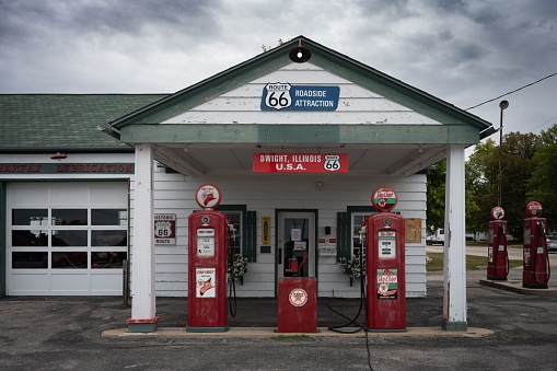 Dwight, United States – August 25, 2022: A Texaco gas station in a rural setting on an empty road in Dwight