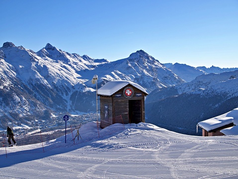 St Moritz, Switzerland – December 19, 2022: A landscape of a skiing area on the alps on a sunny day in St Moritz, Switzerland