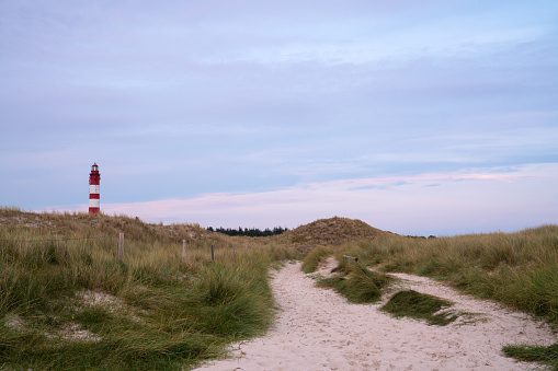 A closeup shot of The Lighthouse in Amrum island, Germany during the sunset