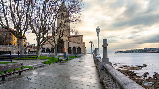 Promenade that runs next to the church of San Pedro in the coastal city of Gijon, Asturias