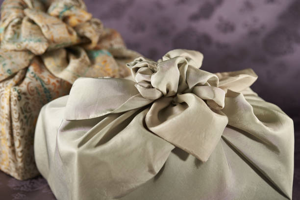 istock Closeup of traditional gift bags, on a patterned surface 1479090134