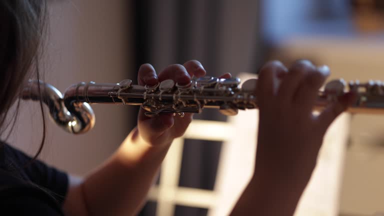 School Girl Plays Flute