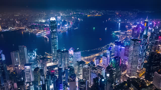 Night hyperlapse aerial view business district/smart city in Hong Kong.