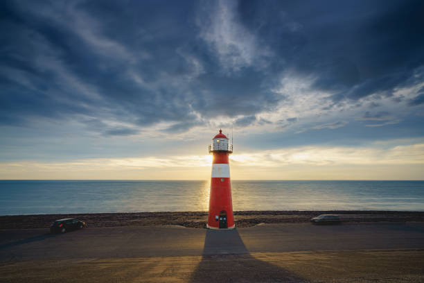 istock Red & white vintage lighthouse at dutch coast in West Kapelle 1479094890