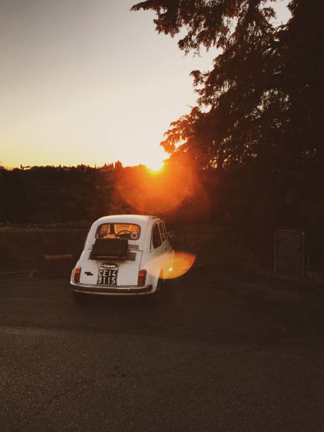 Florence, Italy – February 13, 2019: A fiat in Rome with a sun flare