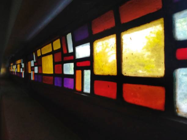 istock Perspective of a small colourful glass window 1479101106